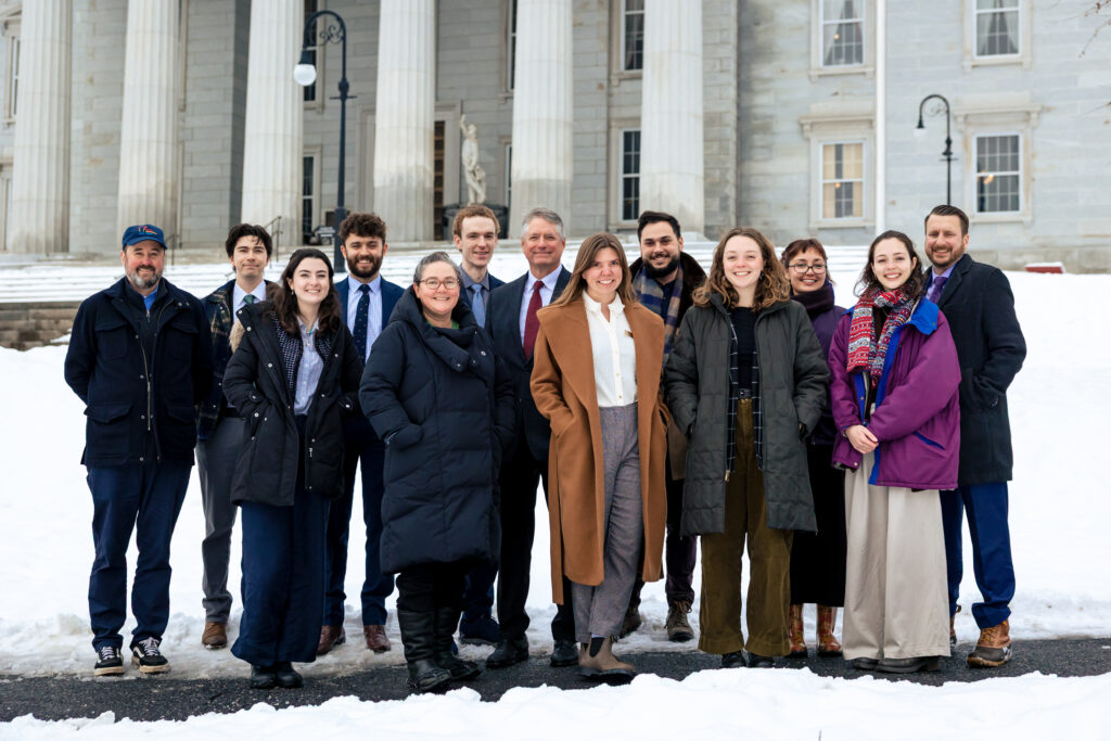 VPIRG's 2026 Staff Photo in front of the State House
